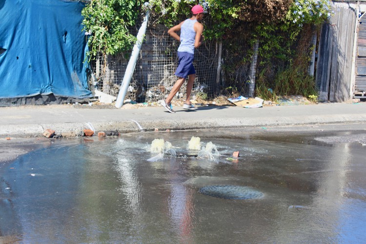 Overflowing drain stinks out Vrygrond GroundUp